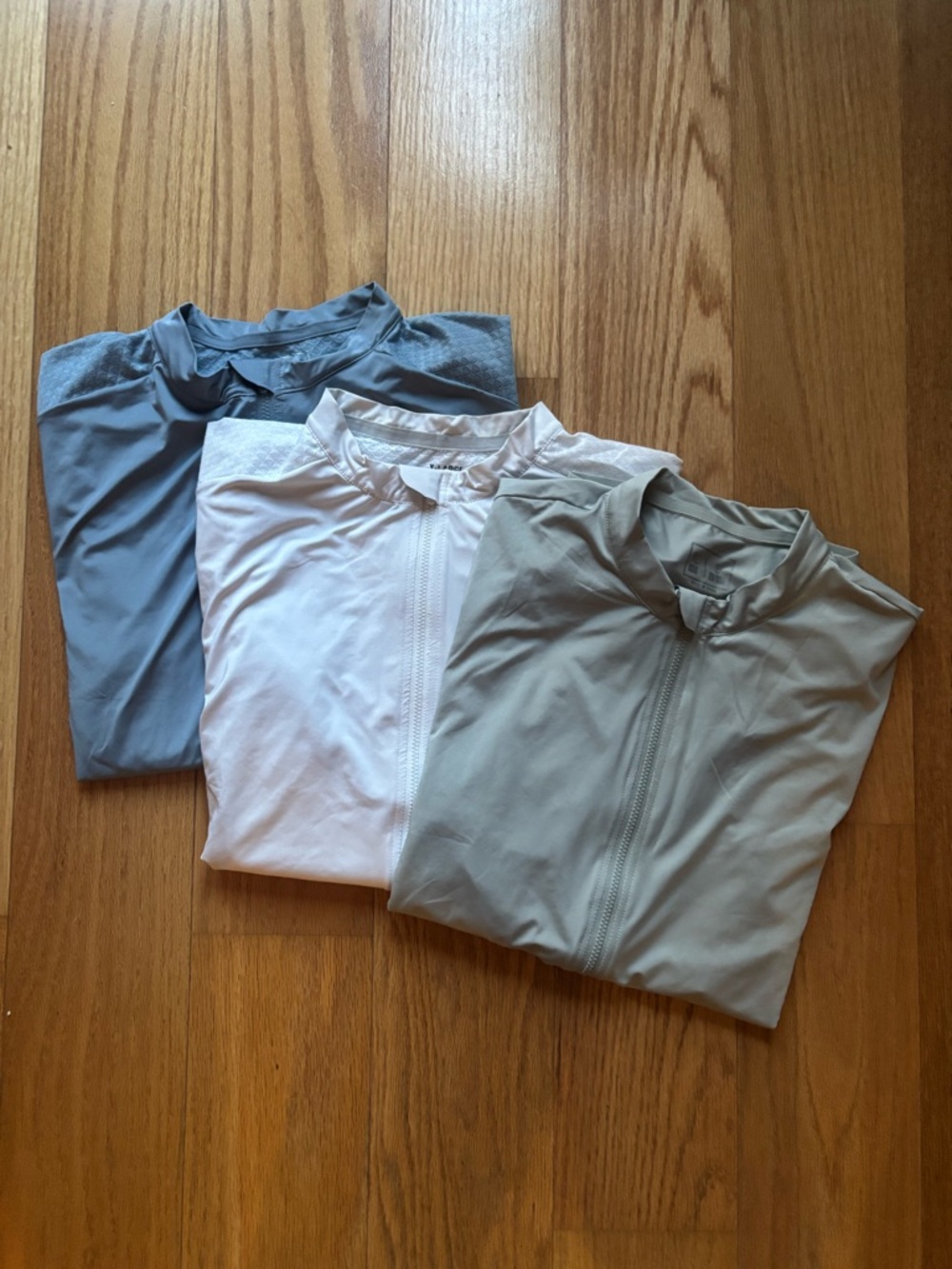 Three YKYW Cycling Jerseys